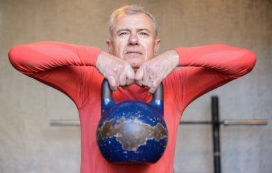 Older man exercising with kettlebell