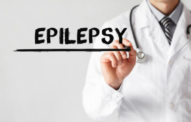 Doctor writing word Epilepsy with marker