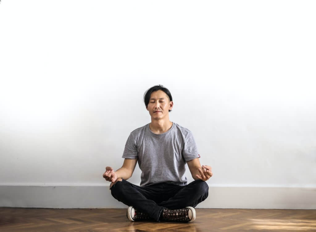 Man practicing mindfulness meditation