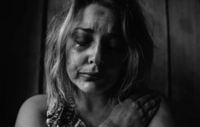 Woman crying, battling depression