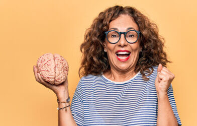 Middle-aged woman holding a brain