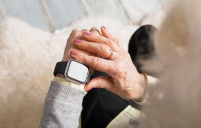 Senior or older adult using a smartwatch