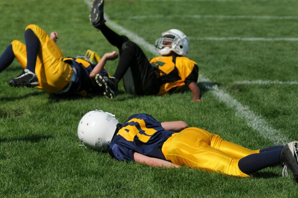Children tackled in youth football with possible concussion