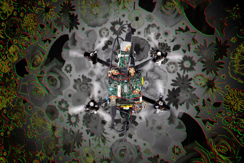 Photo of the “neuromorphic drone” flying over a flower pattern