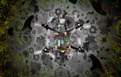 Photo of the “neuromorphic drone” flying over a flower pattern